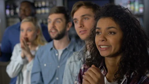 Group of young people rooting for team, national league support, event audience Stock Footage 104888674