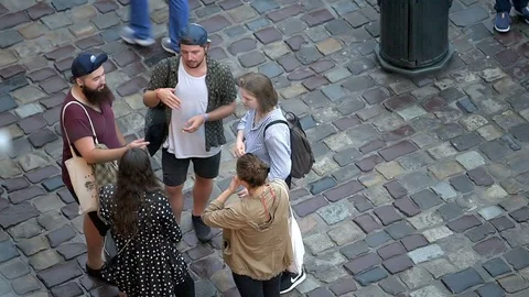 Group of young people standing talking in Lviv, Ukraine city sound Stock Footage 97683992