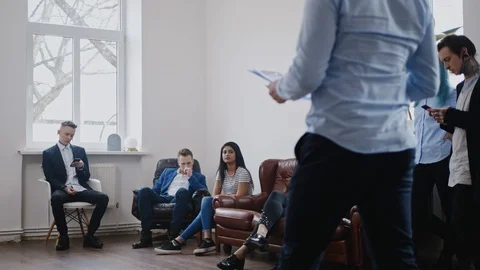 Group of young people waiting for a casting or job interview Stock Footage 107770866