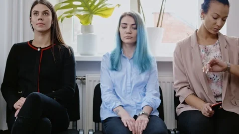 Group of young people waiting for a casting or job interview Stock Footage 108160052