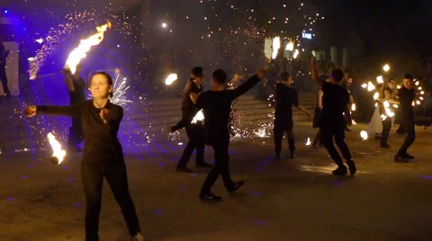 Group of young performers playing with fire Stock Footage 62879929