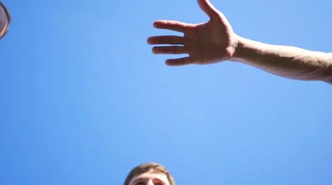 Group of young place their hands together in the center of a circle Vidéo 67749262