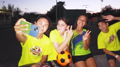Group of Young Student Athletes  Taking a Selfie at Park Stock Footage 221563933