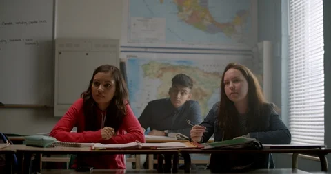 Group of young students in class listen to teacher Stock Footage 118141014