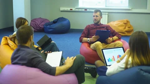 Group of young students sitting in the room Stock Footage 67974997
