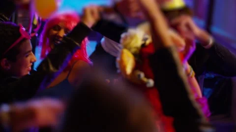 Group of young, stylish multi ethnic people dancing during colorful party Stock Footage 201738079