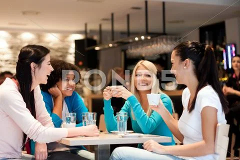 Group of young women on coffee break Stock Photos