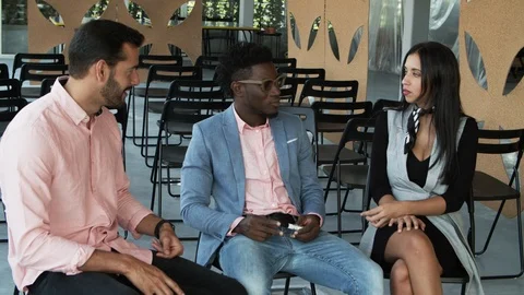 Group of young workers talking in office Stock Footage 119979218