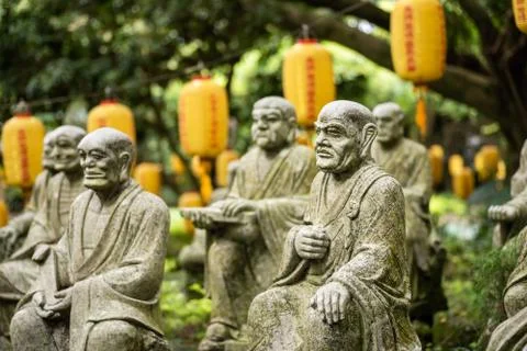 Groups of buddhist arhat stone statue Stock Photos
