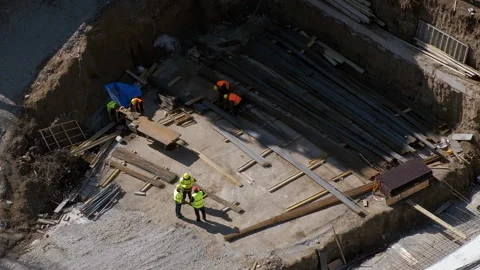 Groups of builders working at the construction site Stock Footage 236473193
