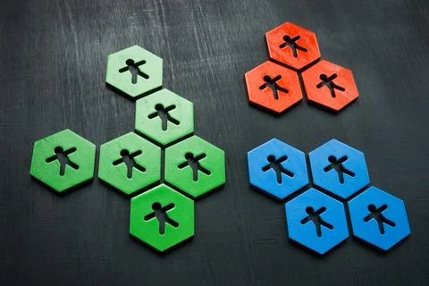 Groups of figures of the same color. Affinity Bias concept. Stock Photos
