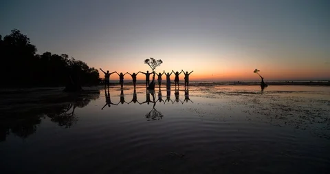 Groups of friends playing and having fun at the beach, Sumba, Indonesia Stock Footage 113780909