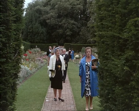 Groups of high class people gather at Glyndebourne house, Sussex, UK 1964 Video stock 132325929