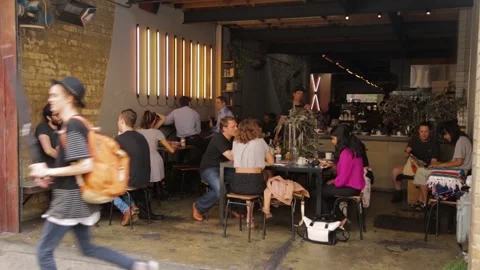 Groups of People Dining and Socializing Inside a Busy Sydney Cafe Interior Stock Footage 345692175