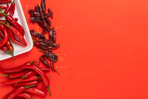 Groups of red chilli peppers and dried chinese hot capsicum Stock Photos