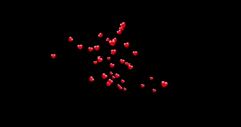 Groups of red hearts flying from left to right on a black background Stock Footage 263714409
