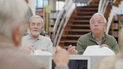 Groups of senior people disputing during class in library Stock-Footage 232621680