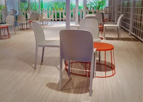 Groups of Small Tables and Chairs with Selective Focus Stock Photos