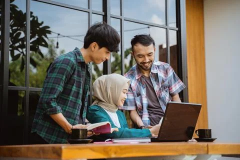 Groups of students meet in the cafe for joint discussions Stock Photos