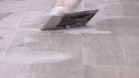 Grouting tiles Stock Footage 111860749