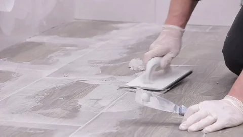 Grouting tiles Stock Footage 111860819