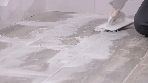 Grouting tiles Stock Footage 111860822