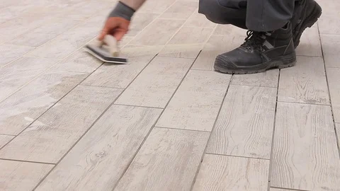 Grouting tiles Stock Footage 111865485