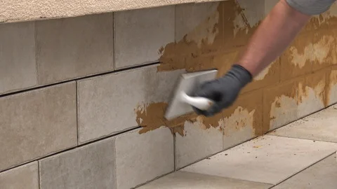 Grouting tiles Stock Footage 111865977