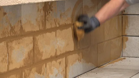 Grouting tiles Stock Footage 111866019