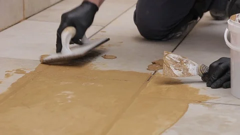 Grouting tiles Stock Footage 111866039