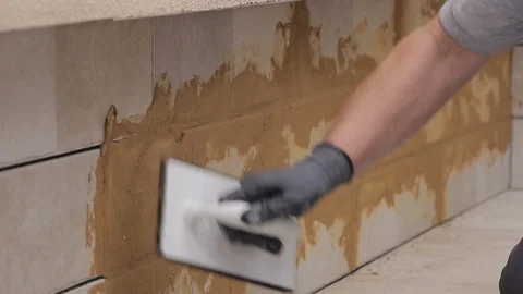 Grouting tiles Stock Footage 111866047