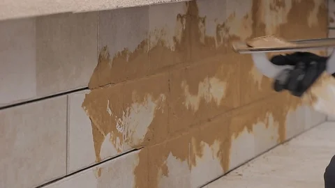 Grouting tiles Stock Footage 111866077