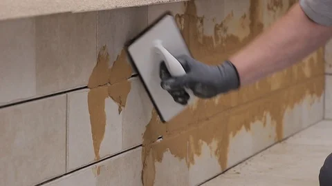 Grouting tiles Stock Footage 111866080