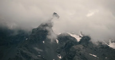Growing clouds on Pizzo Ferrè rocky peak - Italian Alps Stockbeeldmateriaal 252184838