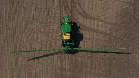 Growing cultivating vegetables. tractor pulls barrel with irrigation system Video stock 230701510