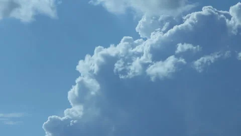 Growing cumulus clouds Stock Footage 99623999