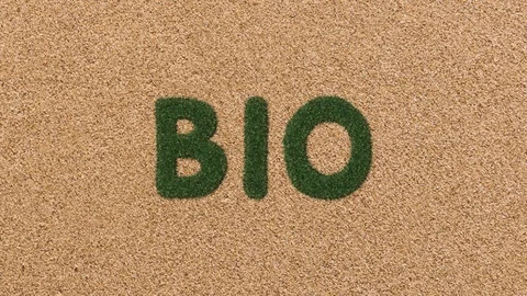 Growing Grass Bio Text with Sand Background Video stock 101976887
