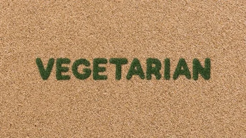 Growing Grass Vegetarian Text with Sand Background Stock Footage 101977259