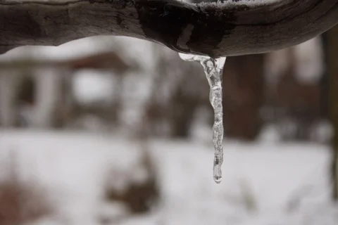Growing icicle during snowfall. Timelapse Stock Footage 108418280