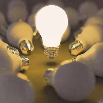 Growing light bulb standing out from the unlit incandescent bulbs as leadersh イラスト素材