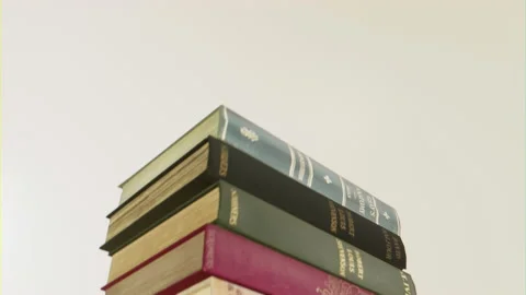Growing stack of books Stock Footage 157806287