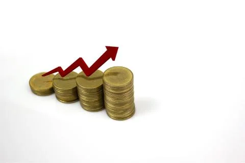 Growing stack of coins with rising red arrow on white background with space o Stock Photos