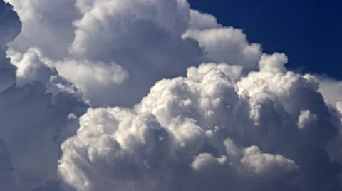Growing turbulent cumulus clouds 4K Stock Footage 36629964