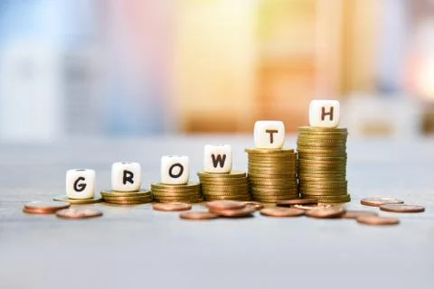 Growth concept - Stack of golden coins  growth of infographics money graph up Stock Photos