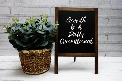 Growth Is A Daily Commitment Quotes Of Inspiration And Motivation Stock Photos