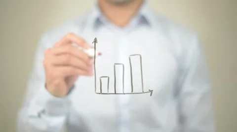 Growth Graph,  Man writing on transparent screen Stock Footage 62986241