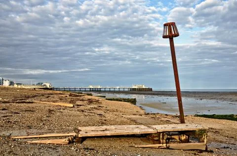Groynes and post on Worthing beach Stock Photos