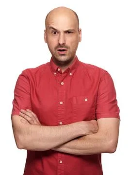 Grumpy bald man looking at camera Foto stock
