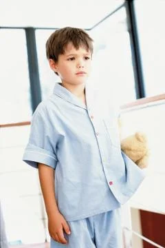 Grumpy boy in the bathroom Stock Photos