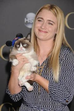  Grumpy Cat, Tabatha Bundersen at the Cindrella Premiere held at The El Ca... Stock Photos
